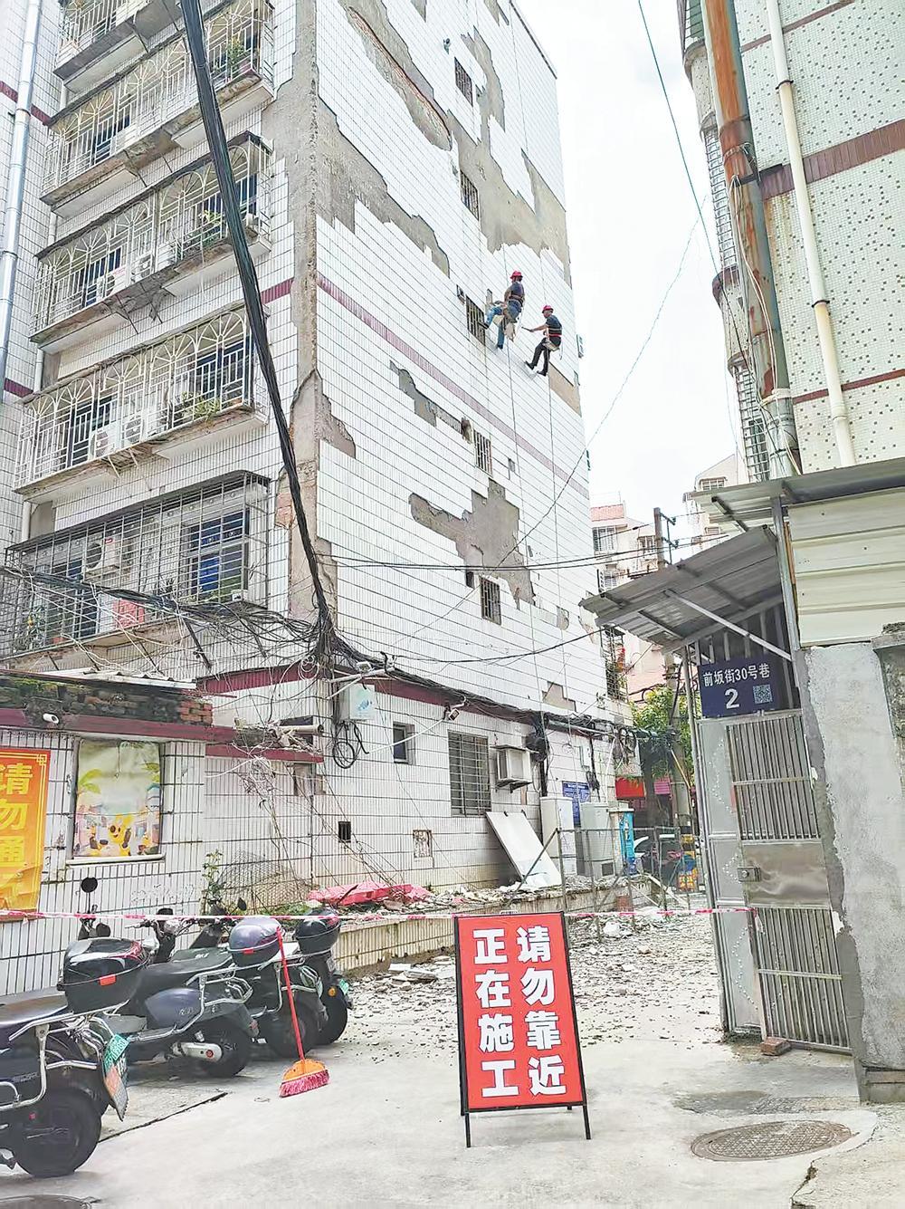 老旧小区外墙瓷砖空鼓脱落多方合力破解“悬在城市上空的痛”(图1)